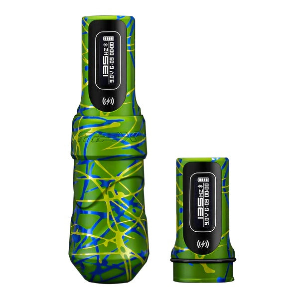 FK Irons Flux Max Samba tattoo machine in vibrant green and blue abstract design, accompanied by an additional PowerBolt 2.0 battery. Features advanced digital display for seamless wireless tattooing and extended power options for professional artists.