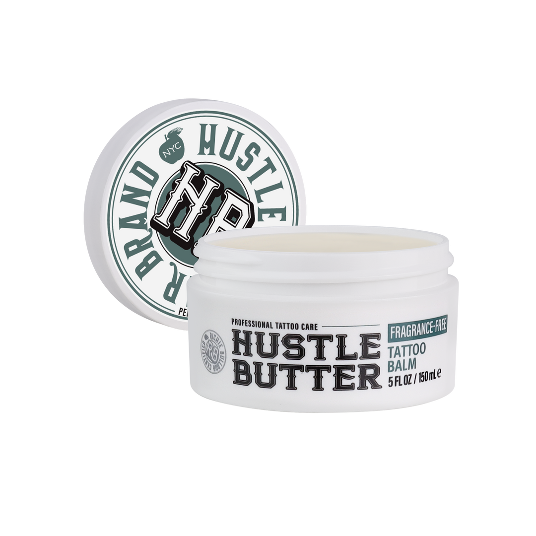 Hustle Butter Fragrance-Free Tattoo Balm 5oz jar with lid leaning behind